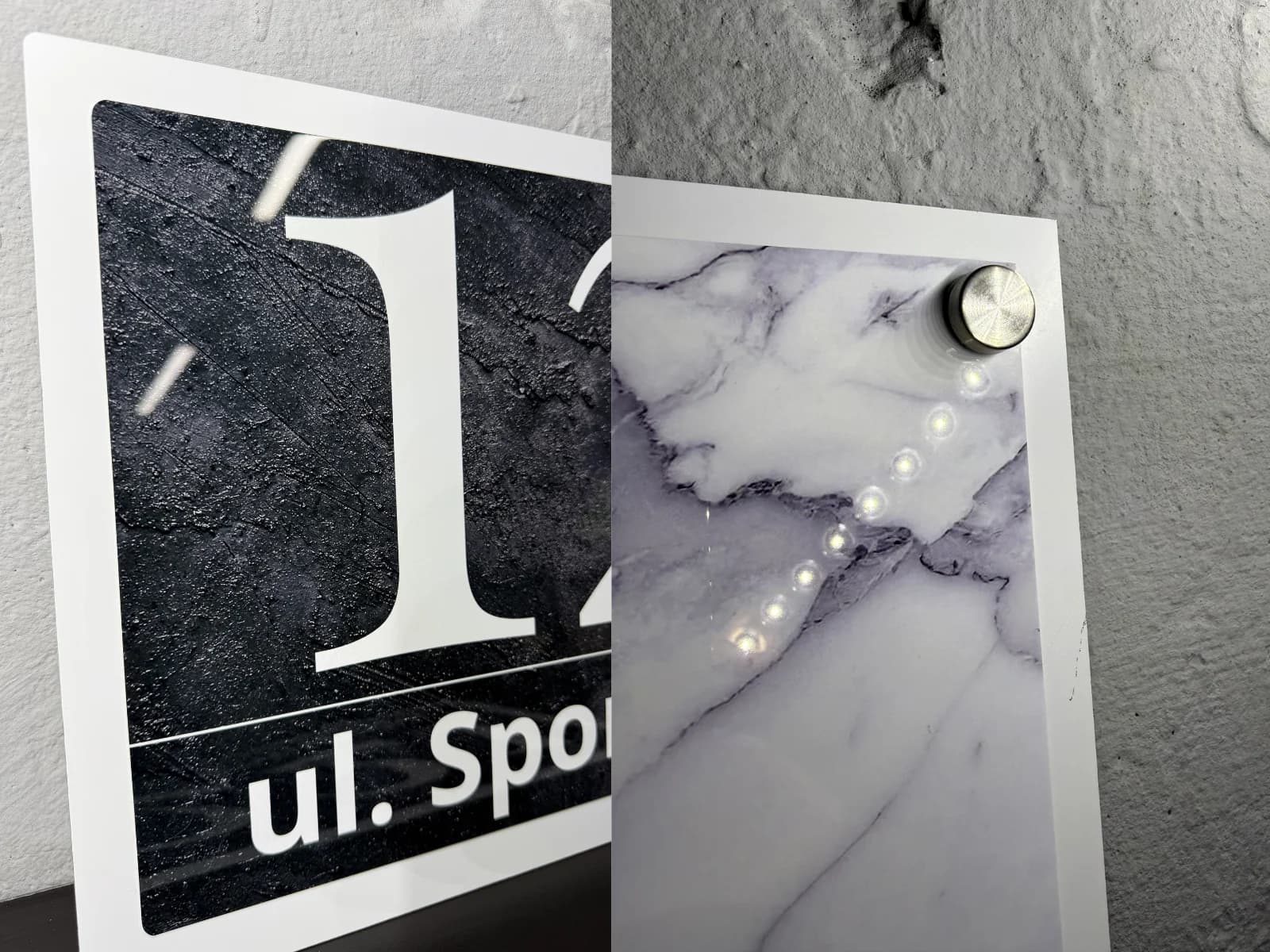 Detail close-up of a Bolot Studio address sign corner showing precision-cut glossy metal edge and glossy finish